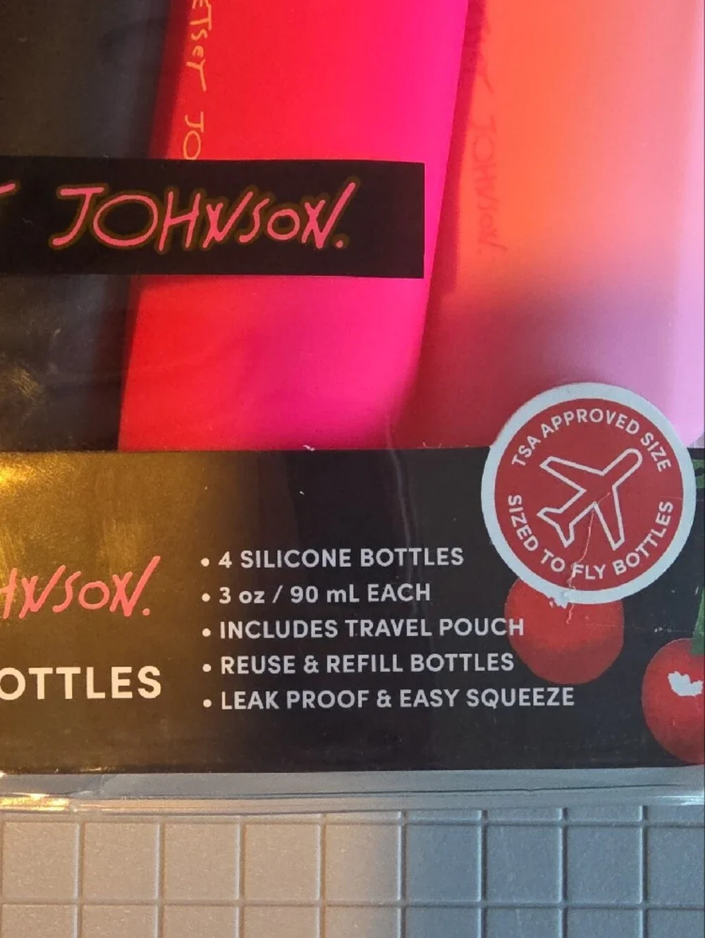 Betsey Johnson Pink, Hot Pink & Black Silicone Travel Bottle Set